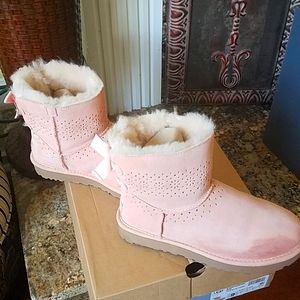Pink Ugg bowtie boots